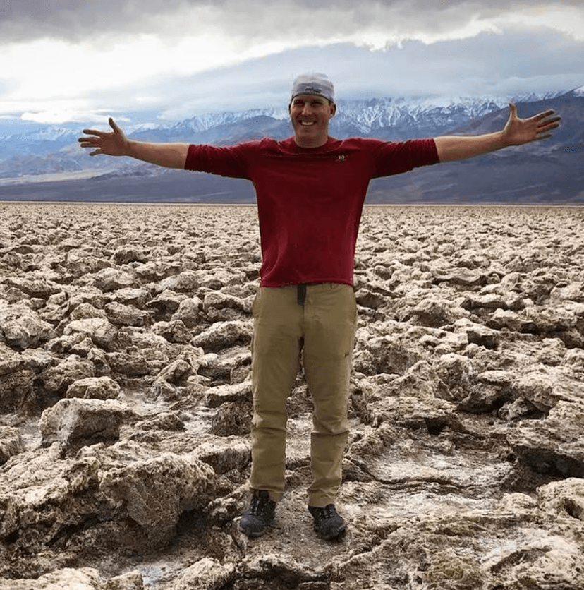 LASN staff member talking to a player at a registration table
